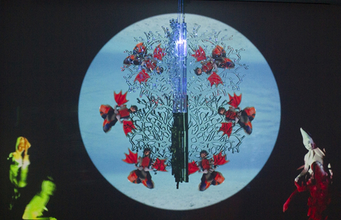 Coral Rainbowmaker 2016 video projection, rotating clear acrylic glass sculpture, suspended from ceiling projector, media player, and speaker 36 x 36 x 23 in / 92 x 92 x 60 cm