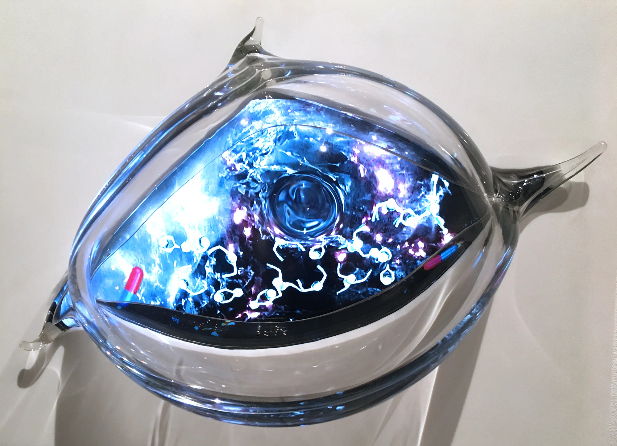 Can Pills Sing a Lullaby? 2017 Single-channel video with sound, 7:10 minutes, looped Hand-blown glass sculpture Video screen embedded in white acrylic On/off switch 15 x 20 x 8 in / 38 x 51 x 20 cm Edition: unique