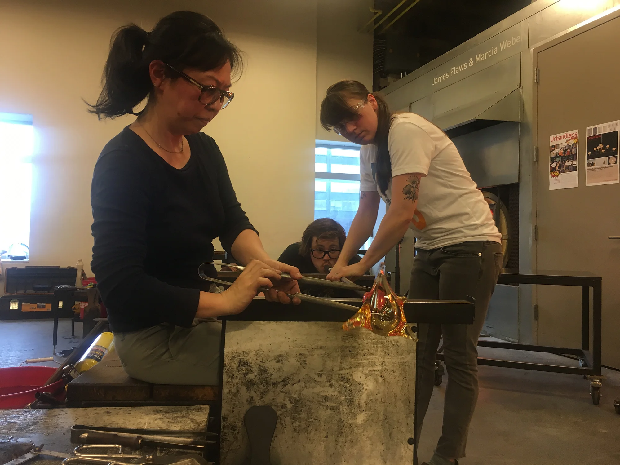 Michiko Sakano and her team making glass sculptures Urban Glass, New York.