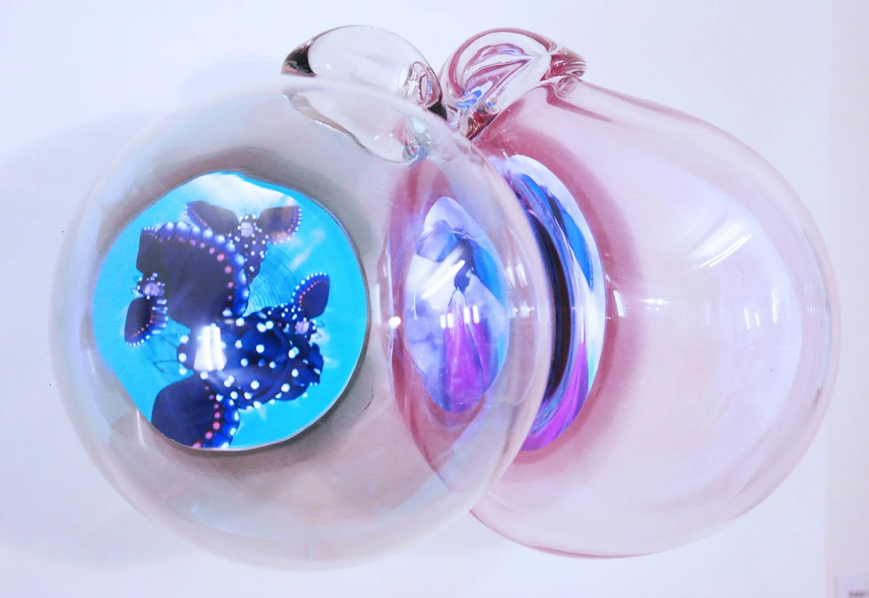 What is the color of the air? 2015 Two-channel video with sound, 5:55min, looped Hand-blown glass bubbles, video screen embedded in white acrylic on/off switch and sound control 14 x 14 x 10 in / 36 x 36 x 25 cm