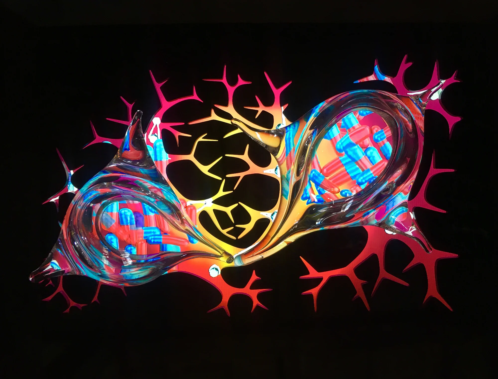 How do we escape from the cage of the brain? 2017 Multi-channel video with sound, 8:15min looped Two hand-blown glass sculptures Video screen embedded in black acrylic On/off switch 15 x 20 x 5 in. / 38 x 50 x 12 cm Edition: unique