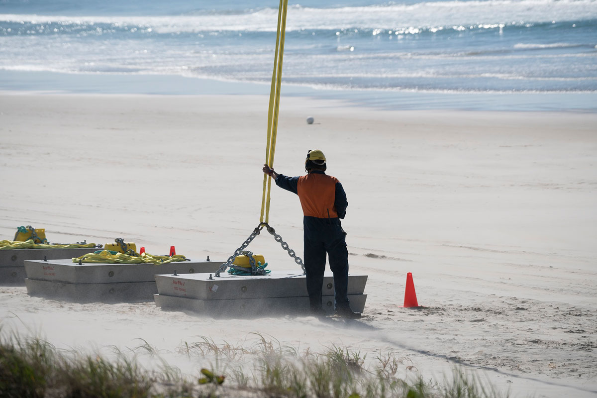 Shark barrier construction continues