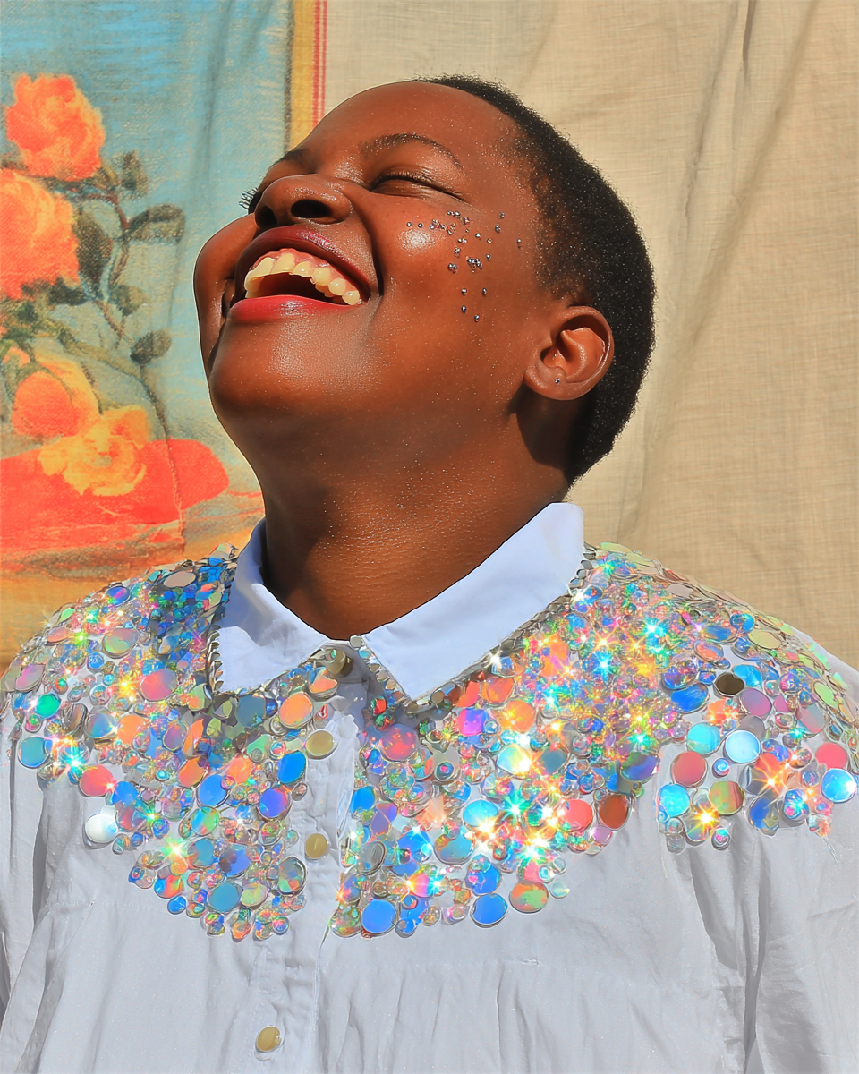 sarahderagon_a_plus-size_Black_woman_laughing_freely_head_til_b9f975a3-d6e5-40ee-9565-b413aa06421b_1.png