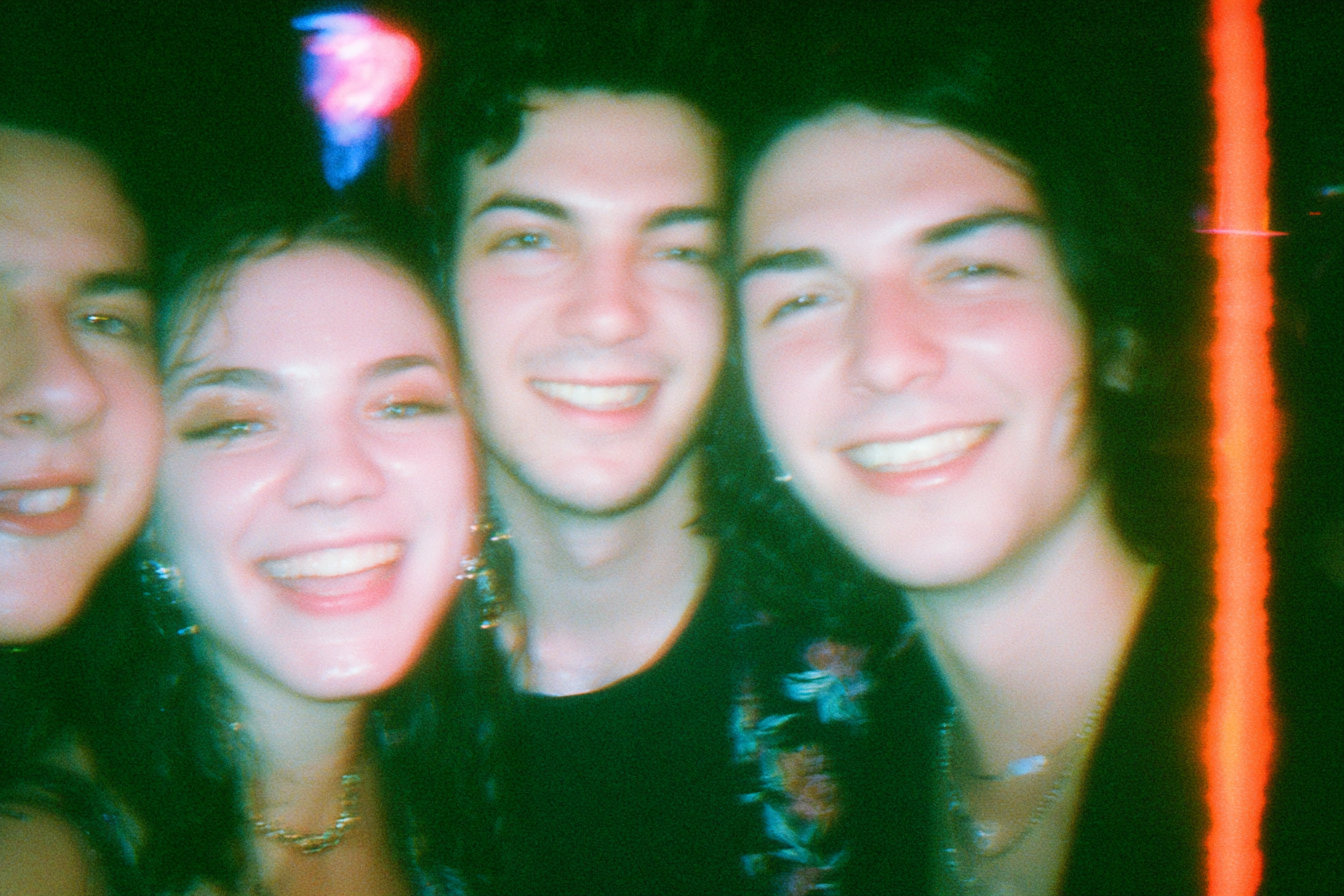 sarahderagon_group_of_queer_friends_collapsing_into_laughter__1846d480-d460-4992-9568-2e67dc70e093_0.png