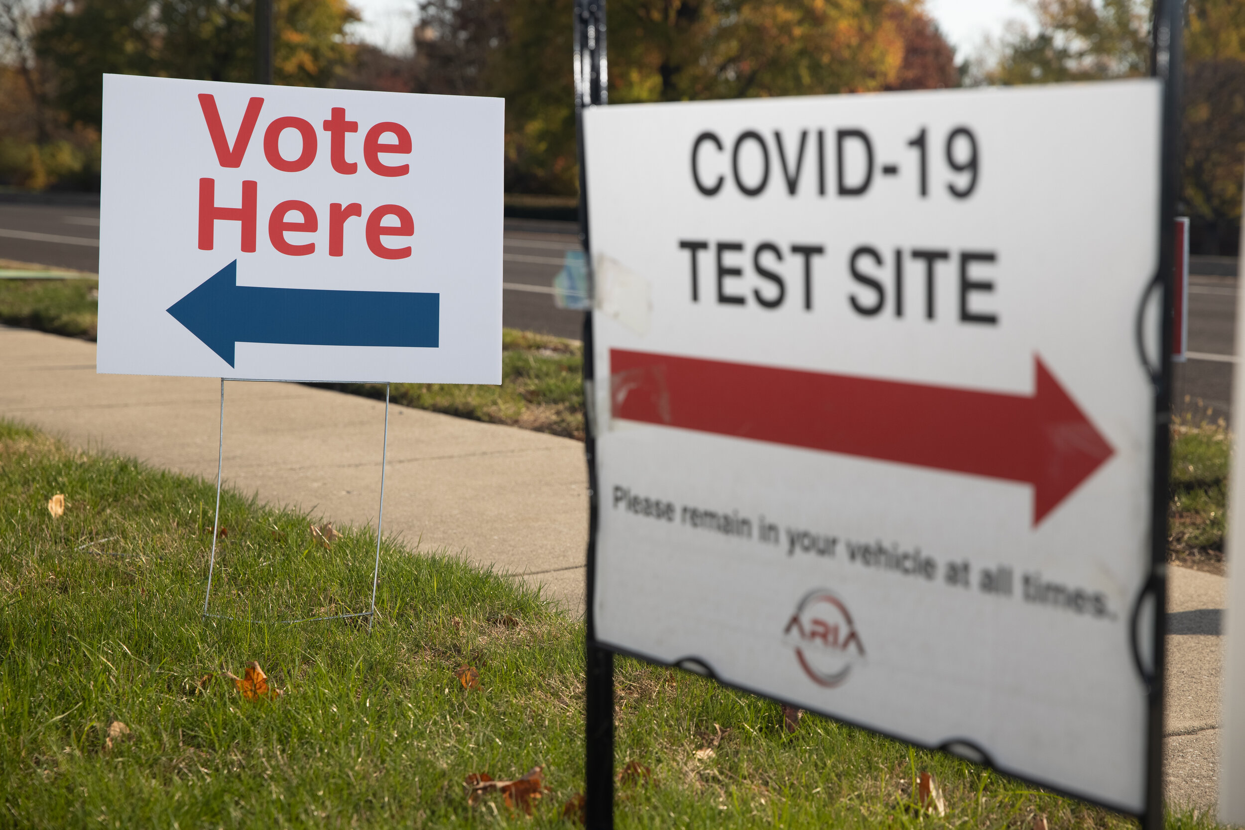 Signs for both voting and COVID-19 testing