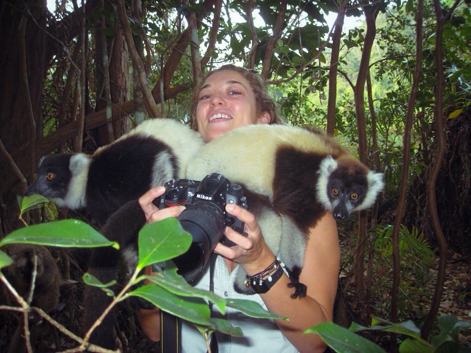 When photo subjects find it more exciting to be behind the lens...! Black-and-white ruffed lemurs in Madagascar.