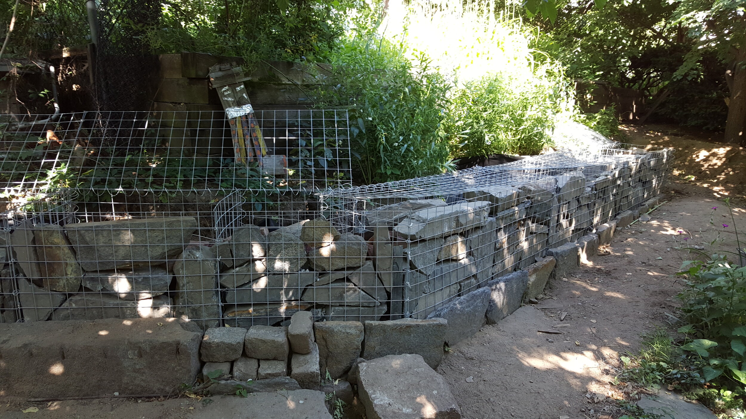Site clean up strategy - Using site waste to fill the gabion cages
