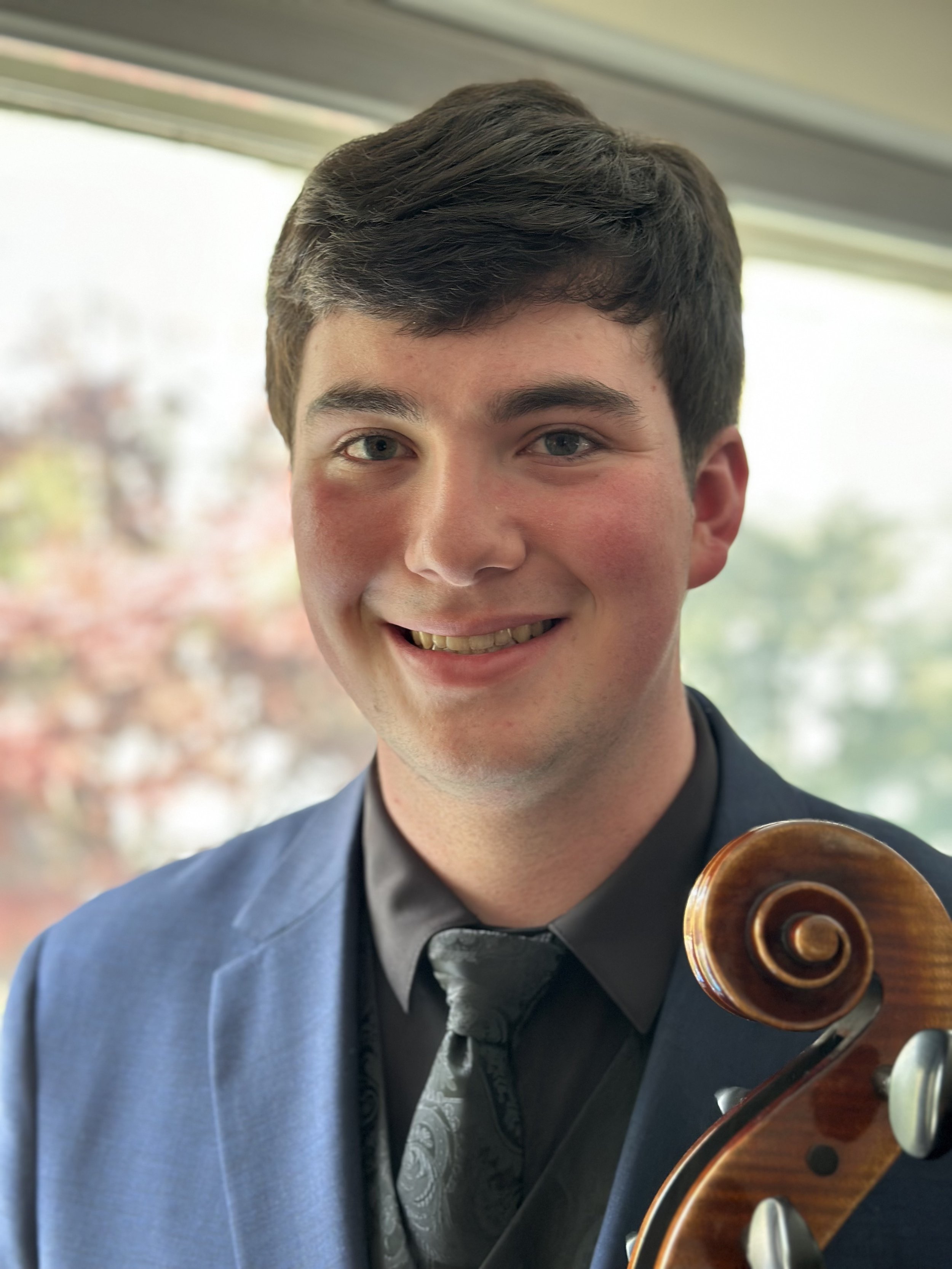 Rowan Mendel - Conductor