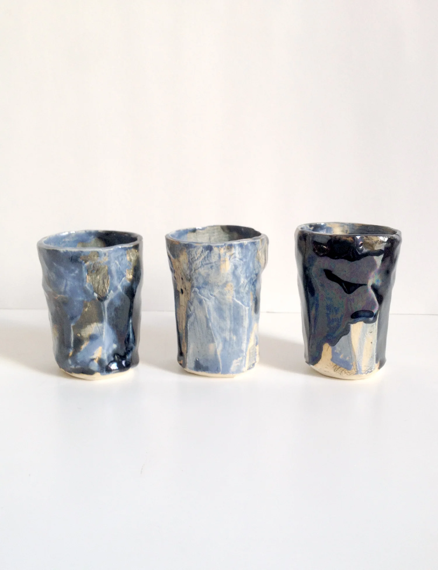 Black chiseled cups