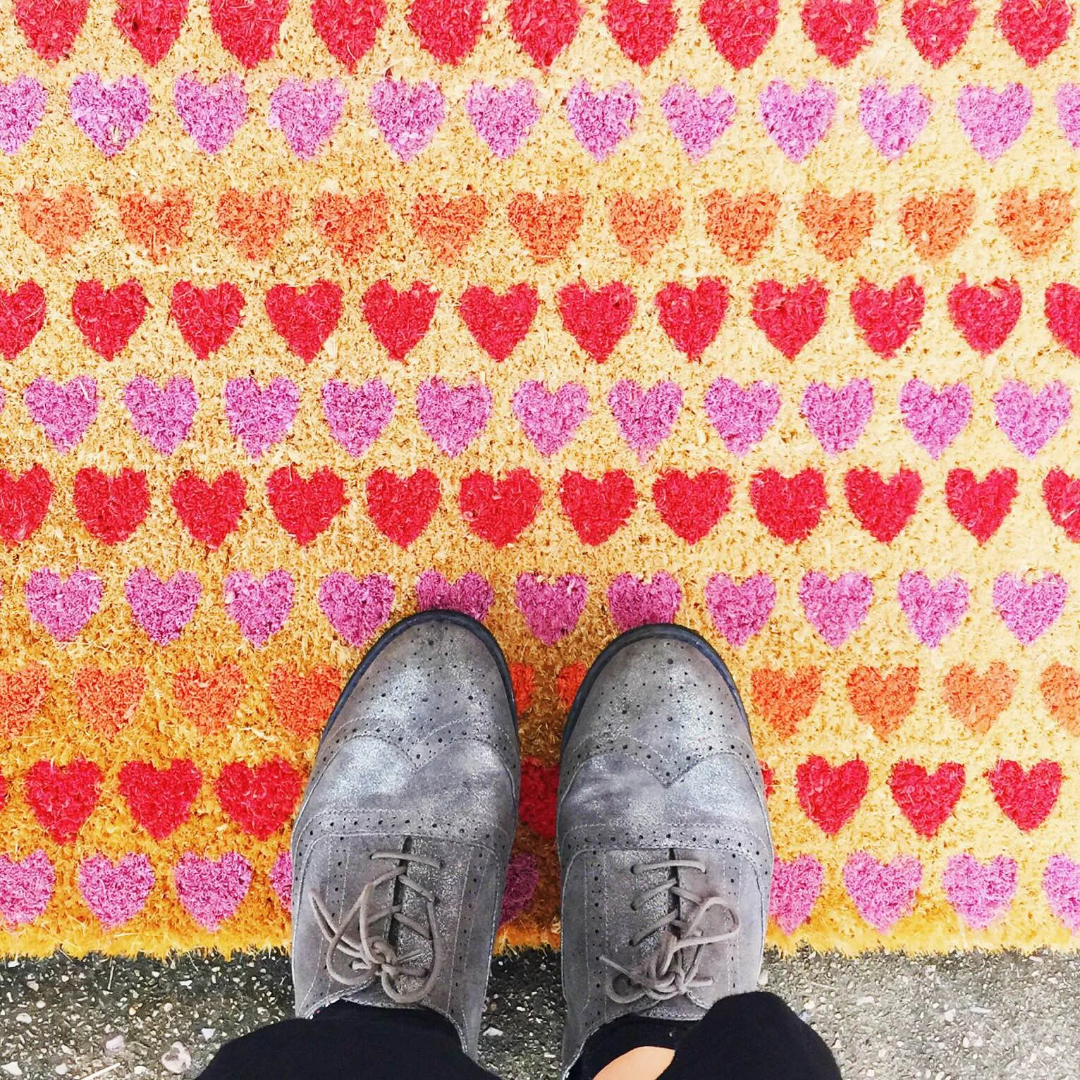Though technically a doormat and not a rug, this baby was $4 at a thrift store, hanging up with the bathmats. Do your digging, people!