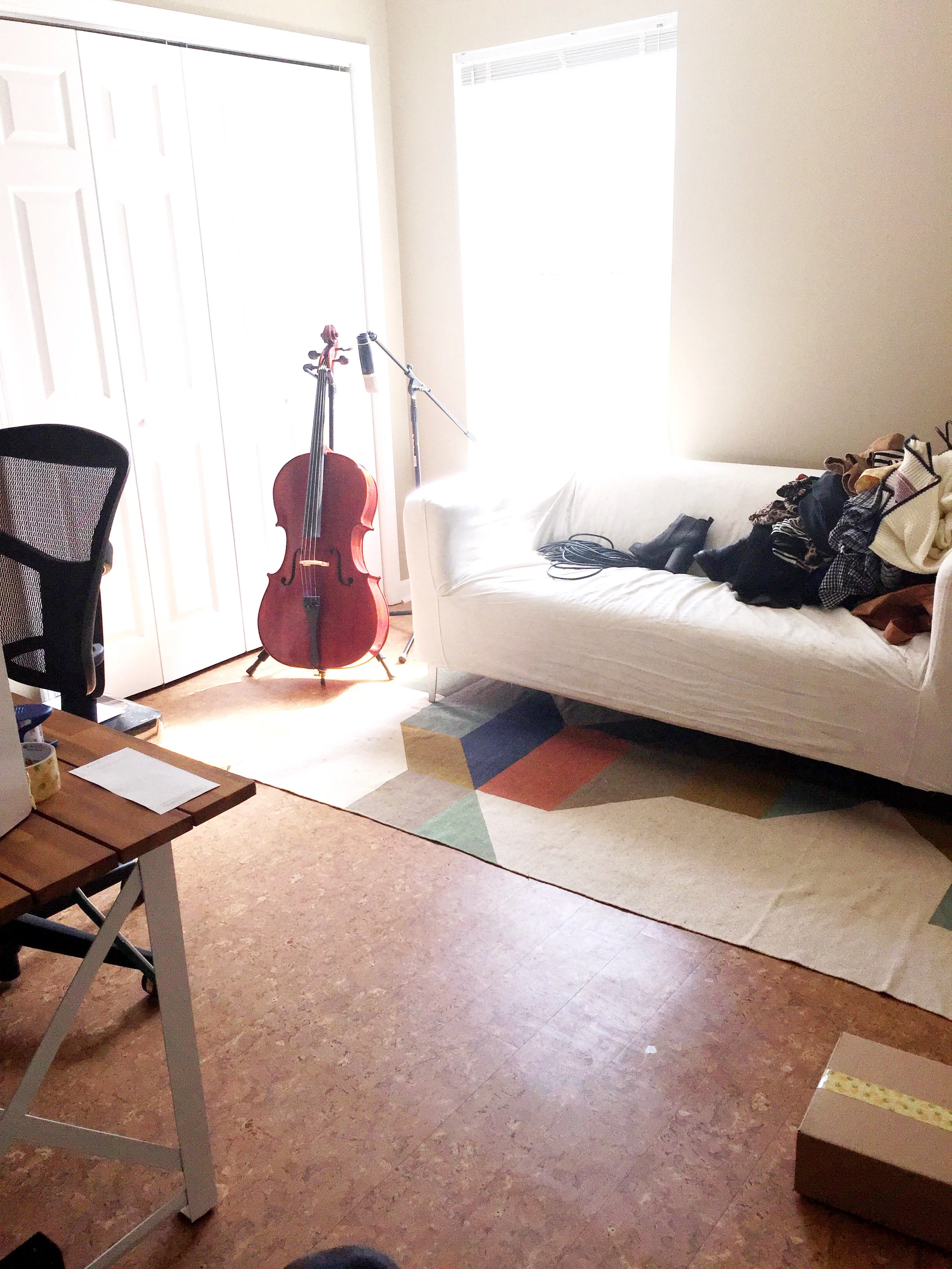 More studio pics. This house has AMAZING natural light! one more time, all together: "UGH THE FLOORS!" Seriously. Who thinks about getting cork-looking laminate planks for their floors? In the WHOLE house?