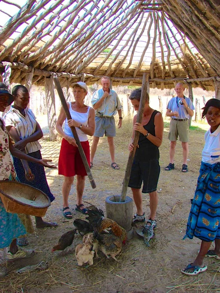 Pounding millet in a local community. (Photo: Imvelo Safaris)