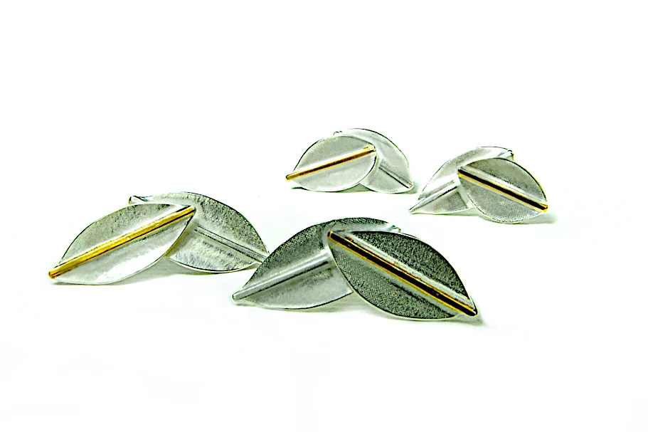 Double leaf silver ear studs