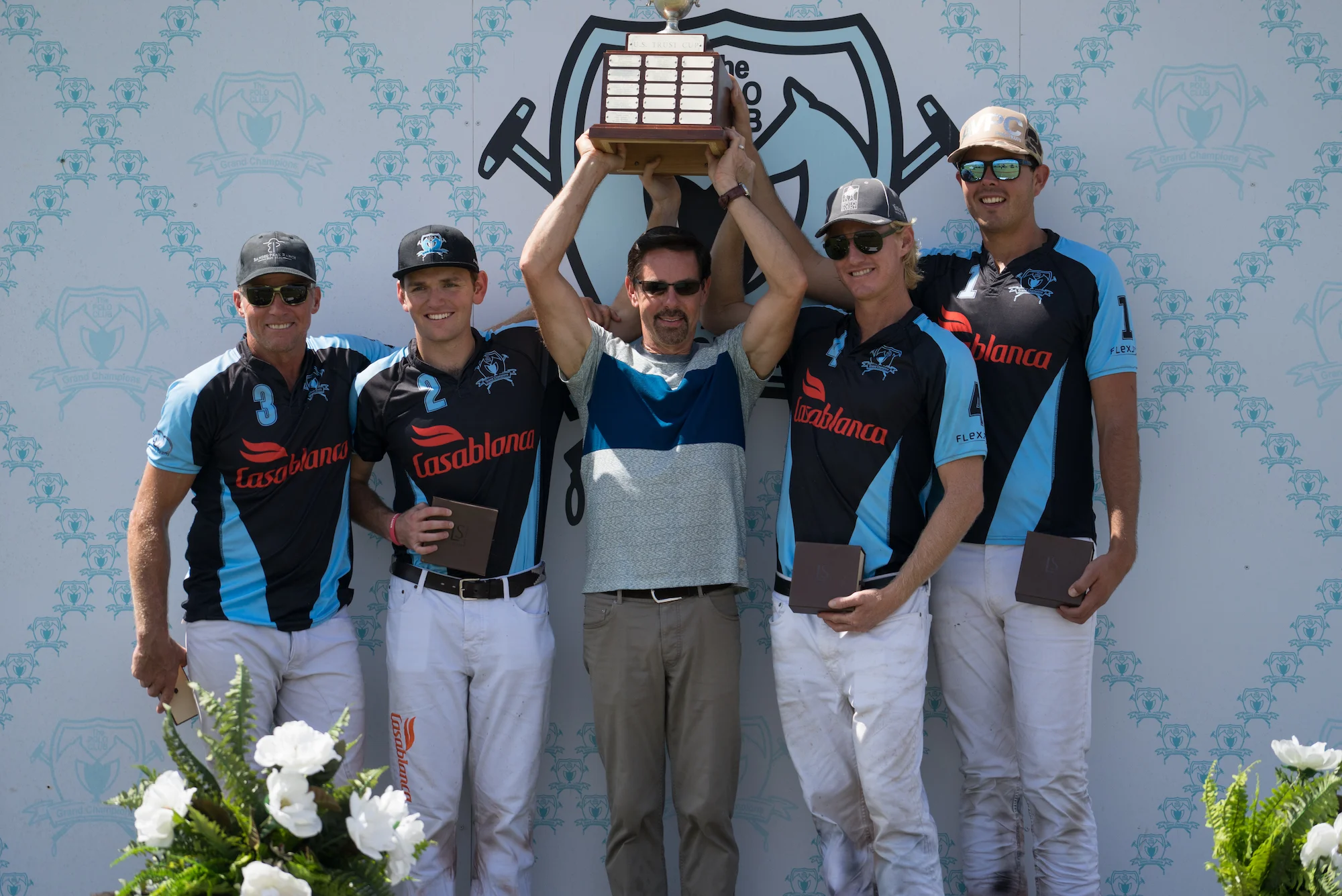 Casablanca winning teammates Mike Azzaro, Grant Ganzi, Jason Crowder and Cacho Galindo with awards presenter USPA CEO Bob Puetz.