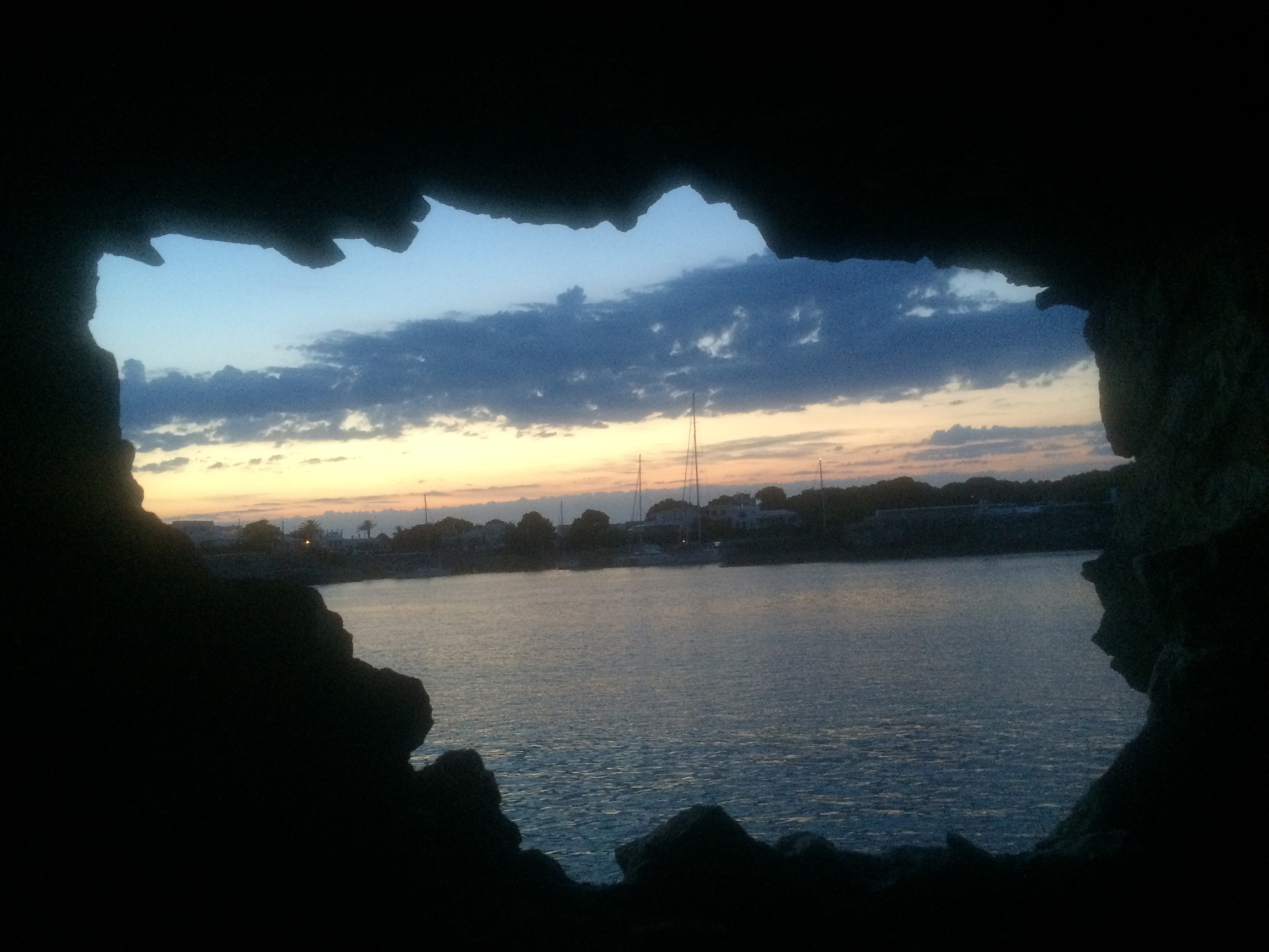 Even caves have windows to watch the sunset... (Port - Ciutadella)