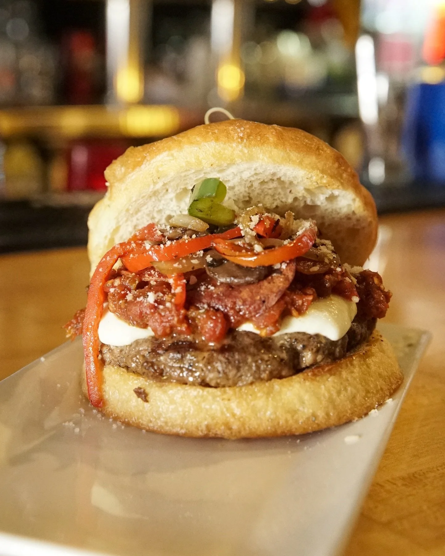 APRIL SPECIALS HAVE ARRIVED!

Cowabunga! Burger 
Italian sausage and beef patty, spicy marinara, sauteed peppers, onions and mushrooms, pepperoni, fresh mozzarella, fresh basil, parmesan, Farm 2 Market focaccia bun.

Korean Beef Slider Basket 
Bulgog