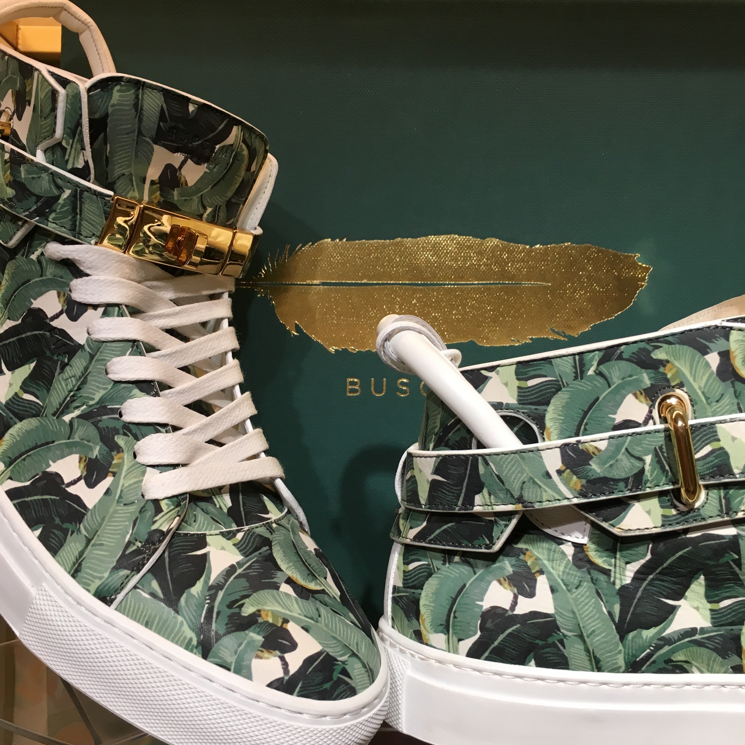 the iconic banana leaf motif on these custom sneakers, Available the GIFT SHOP, $1,100