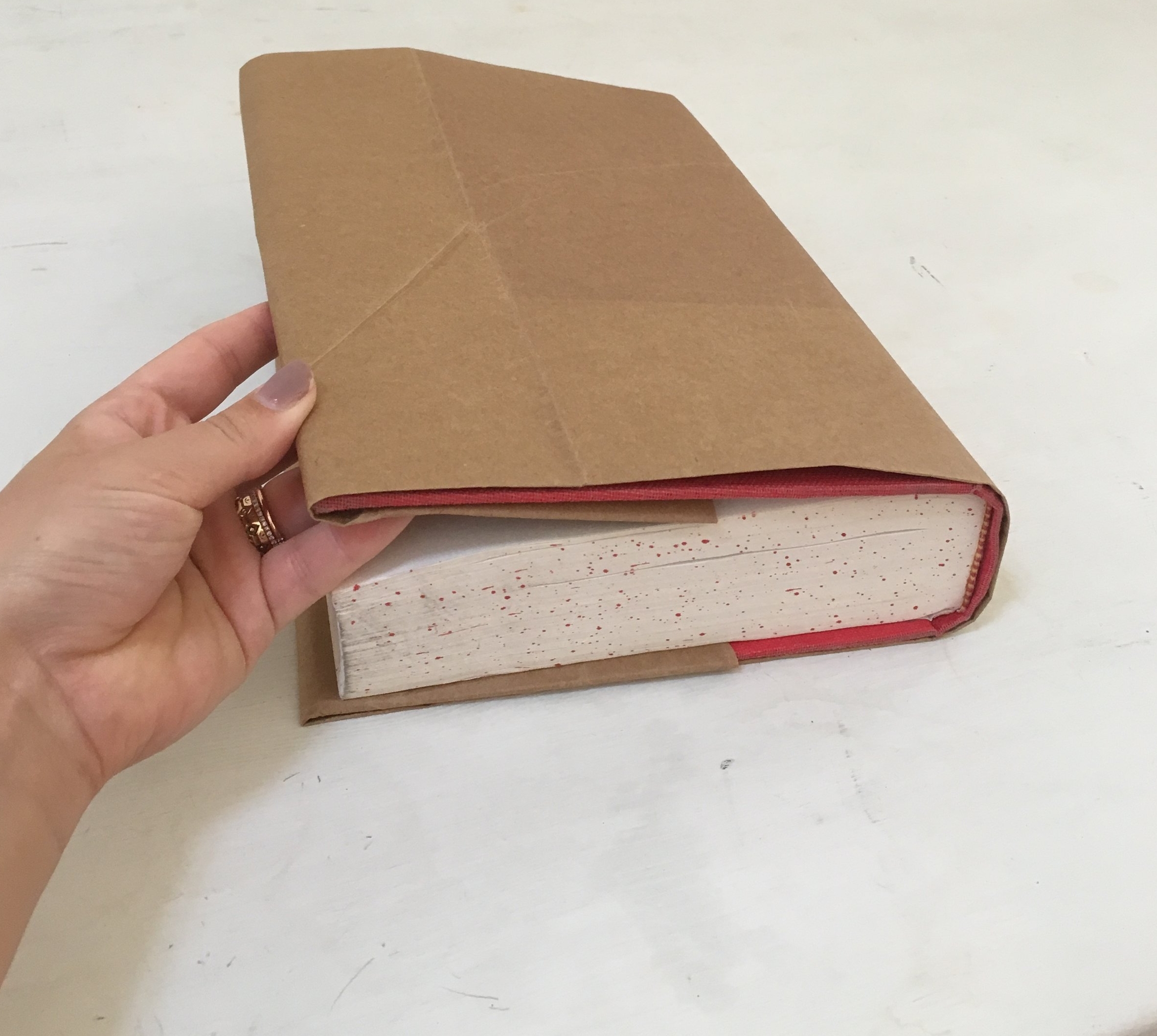 How to make a book cover from a paper grocery Sack. — Ross