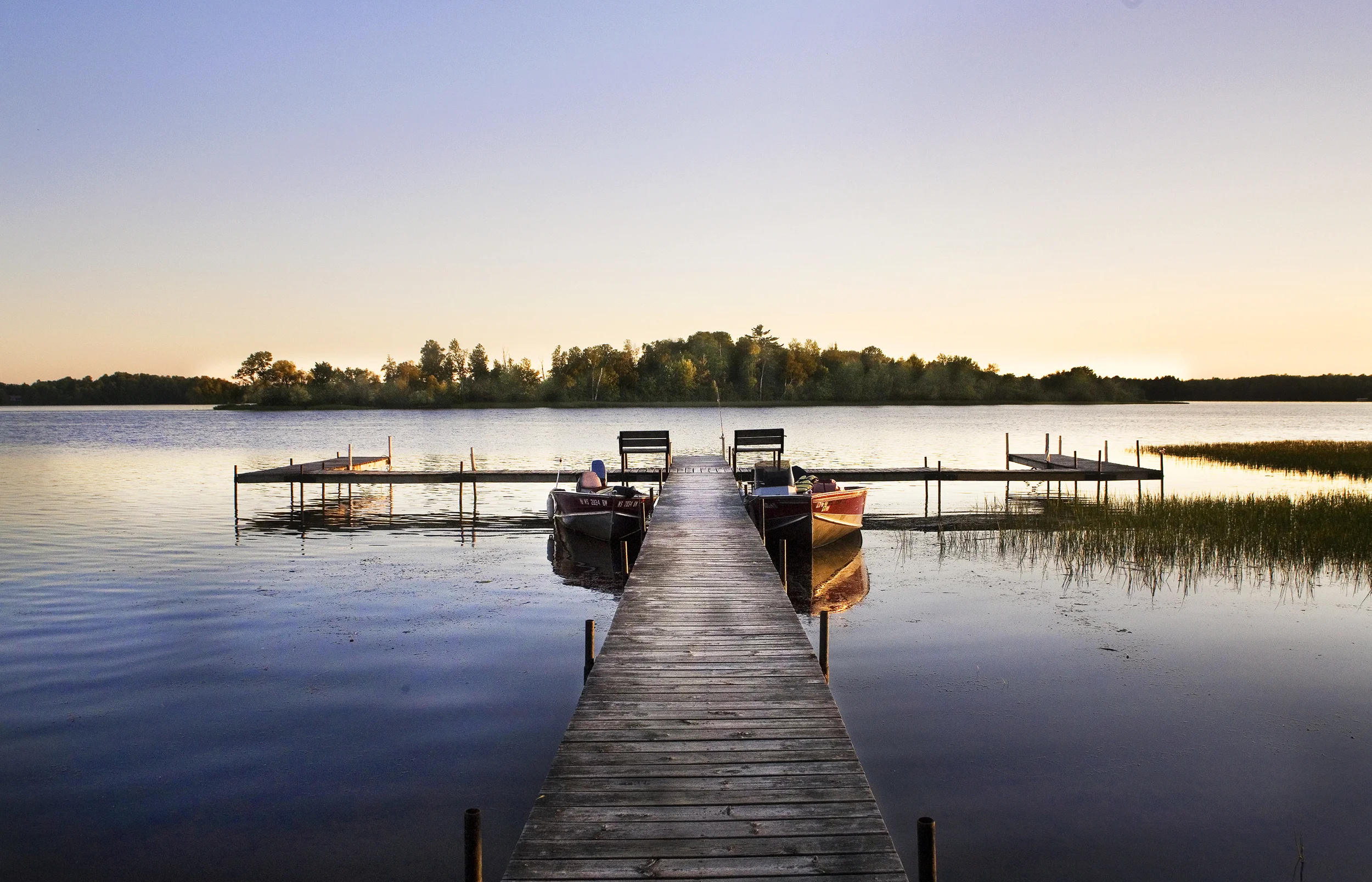 This is one of my favorite places. Butternut Lake. ...the story goes, that the land you see straight out from the dock, Shatterack Island, which is owned by my cousins' family, was won in a poker game by their grandfather in the 1920's...however it came into the family, I love to visit each and every time.