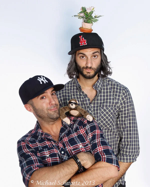 Vincent Oshana (L) and Amir K