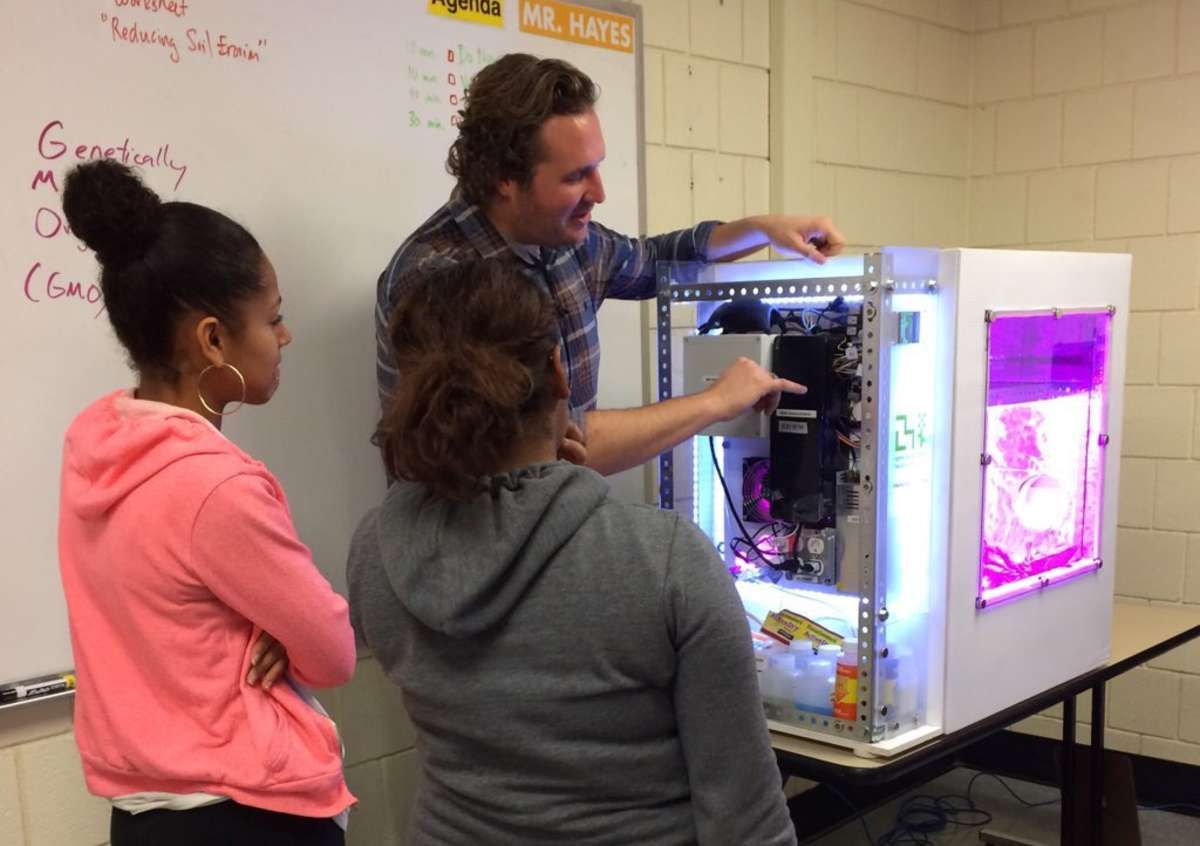 Caleb Harper with school children and the Personal Food Computer