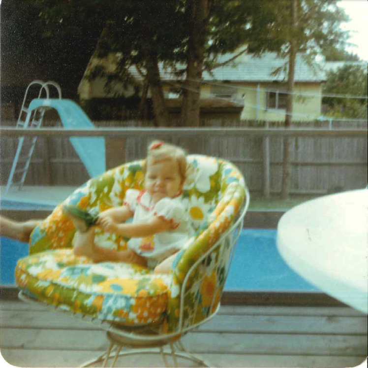 Erin hanging by the pool, circa 1979 (age 1.5). 
