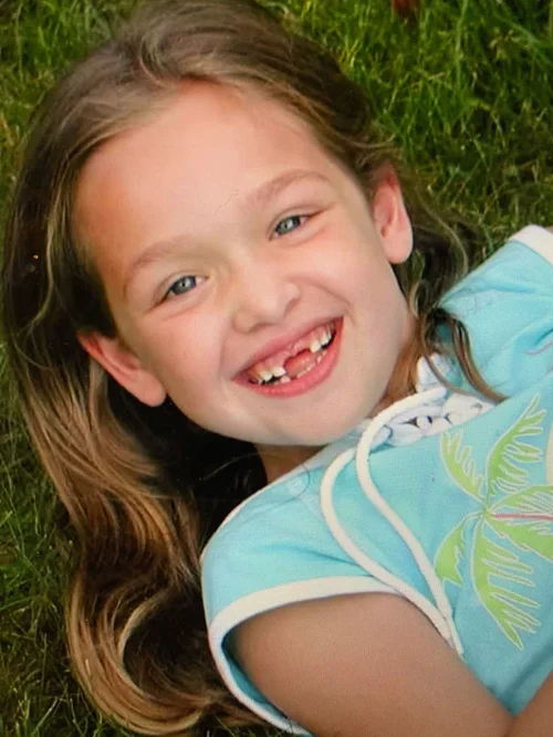 Olivia after losing her two front teeth