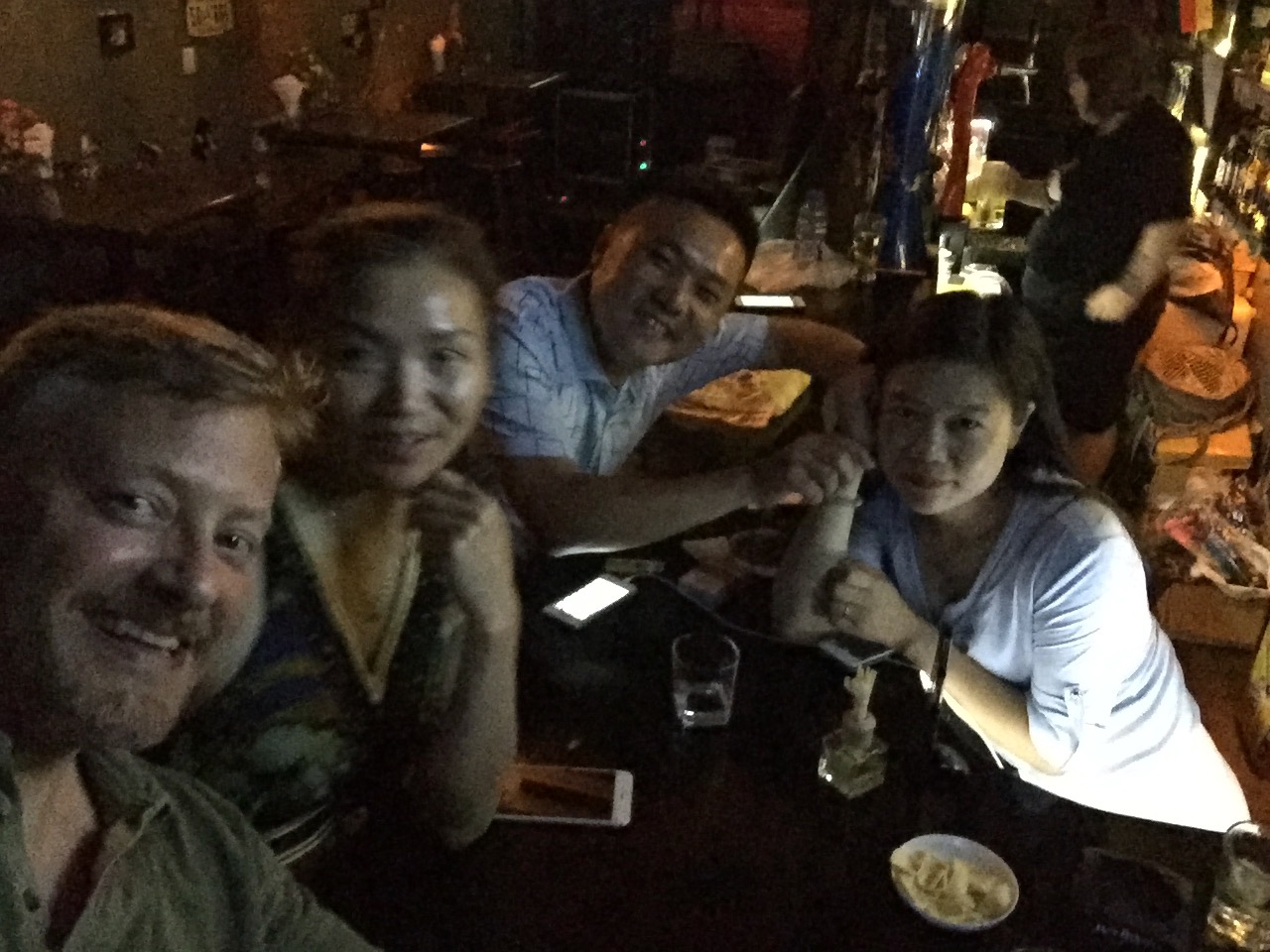 Soaking in the friendly neighborhood bar vibe with Amei and others at Cosmo Bar