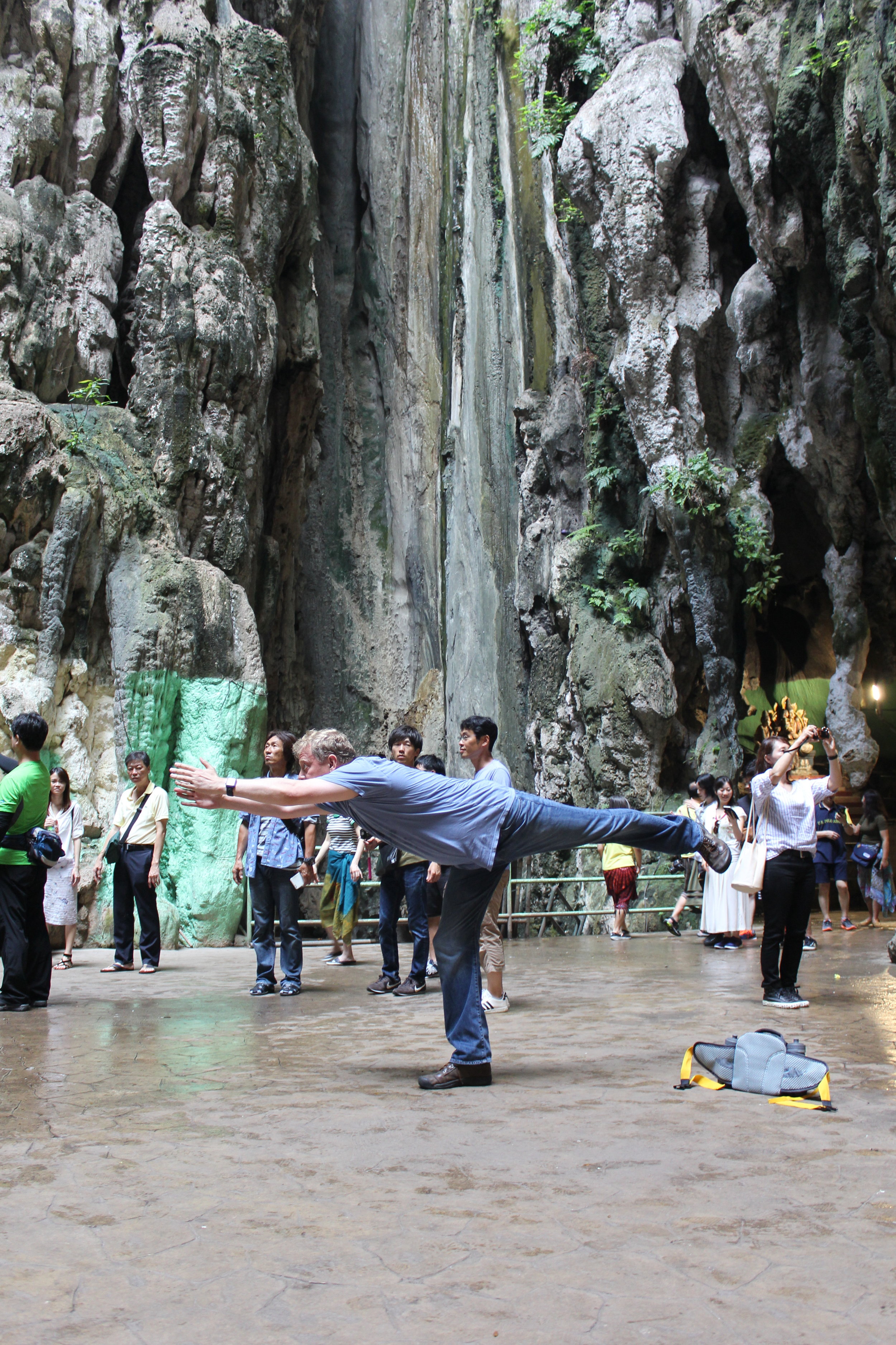 Practicing my yoga, and my levitation skills, in the Batu Caves