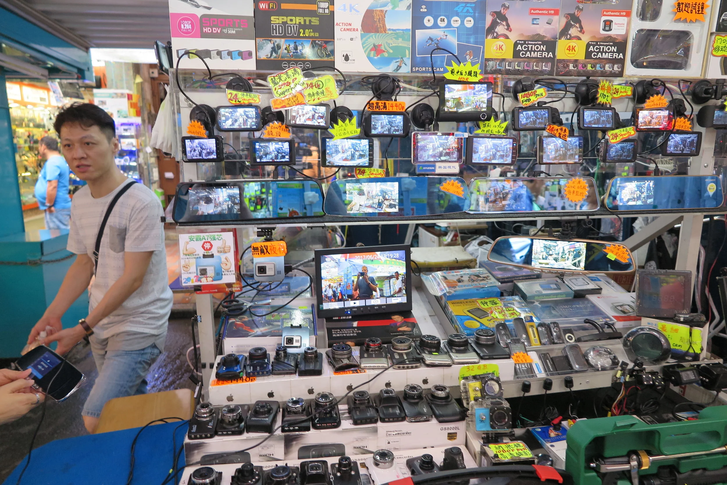 one of hundreds of electronics stalls in the street markets of Sham Shui Po in Kowloon