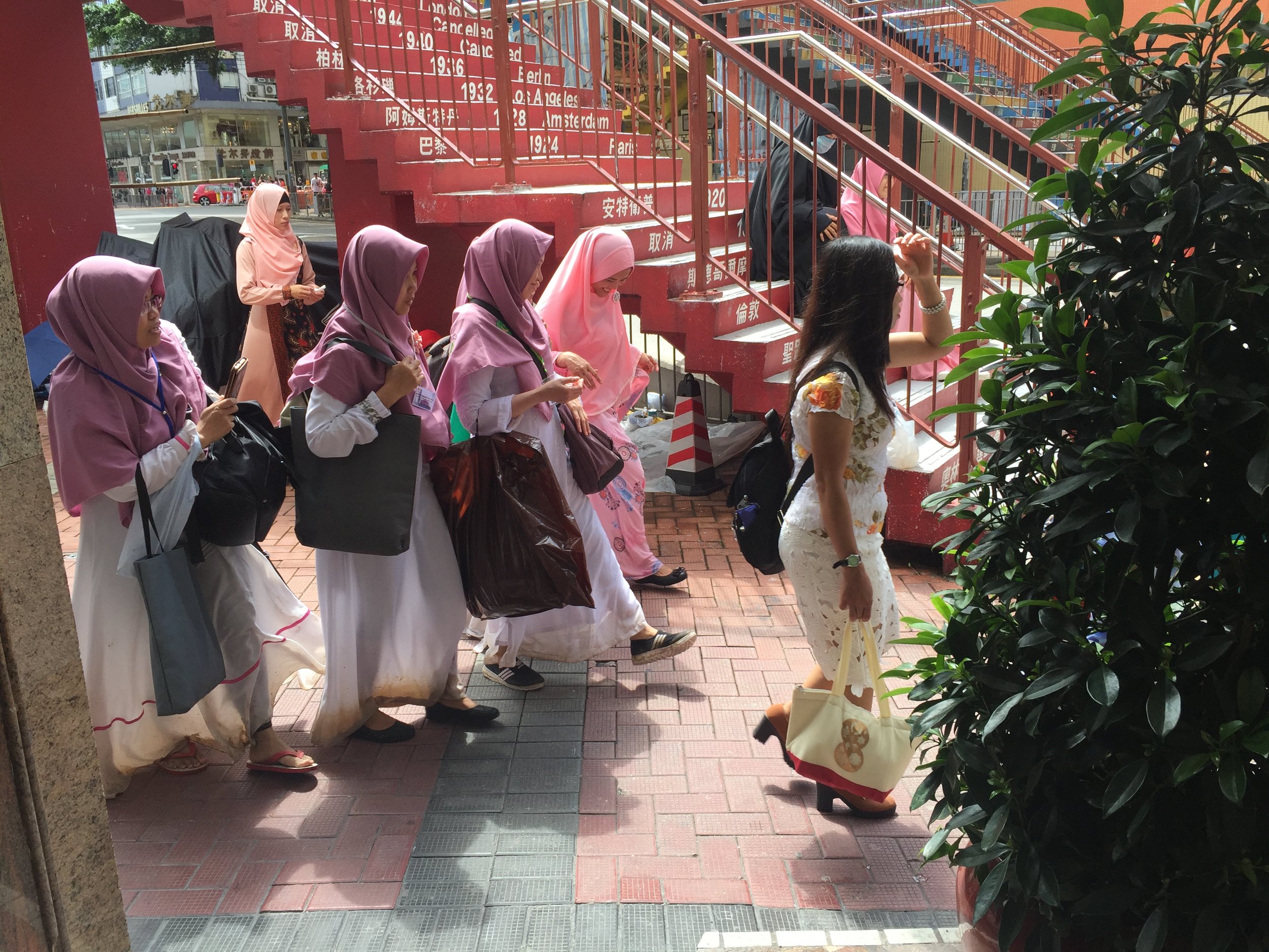 I have been told that Indonesians, who make up a large percentage of the domestic labor force in Hong Kong, congregate in the Causeway Bay area on Sundays. Apparently so!