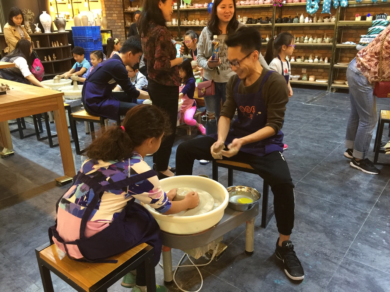 A pottery making shop in a Shanghai mall next to Jing'an Park, where Hannah and her classmates had a birthday party. Cities are always full of fun surprises.