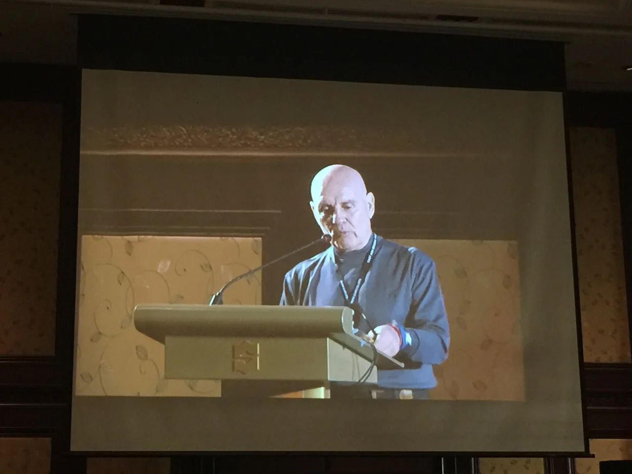 Dick Krajczar, Executive Director of EARCOS making announcements during the keynote presentation