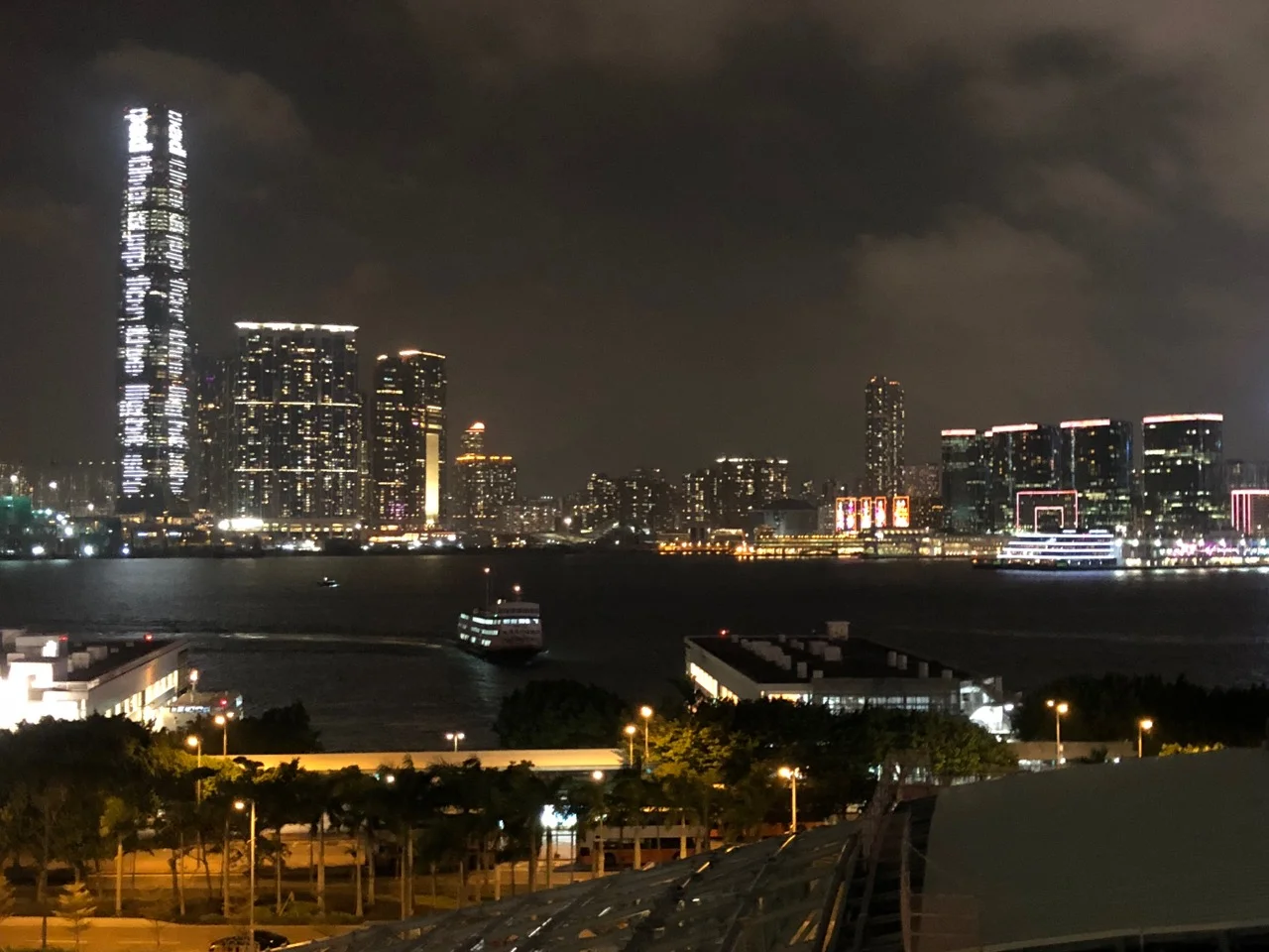 The view from atop the IFC Mall of Hong Kong's Bladerunneresque nightscape, looking out towards Kowloon side