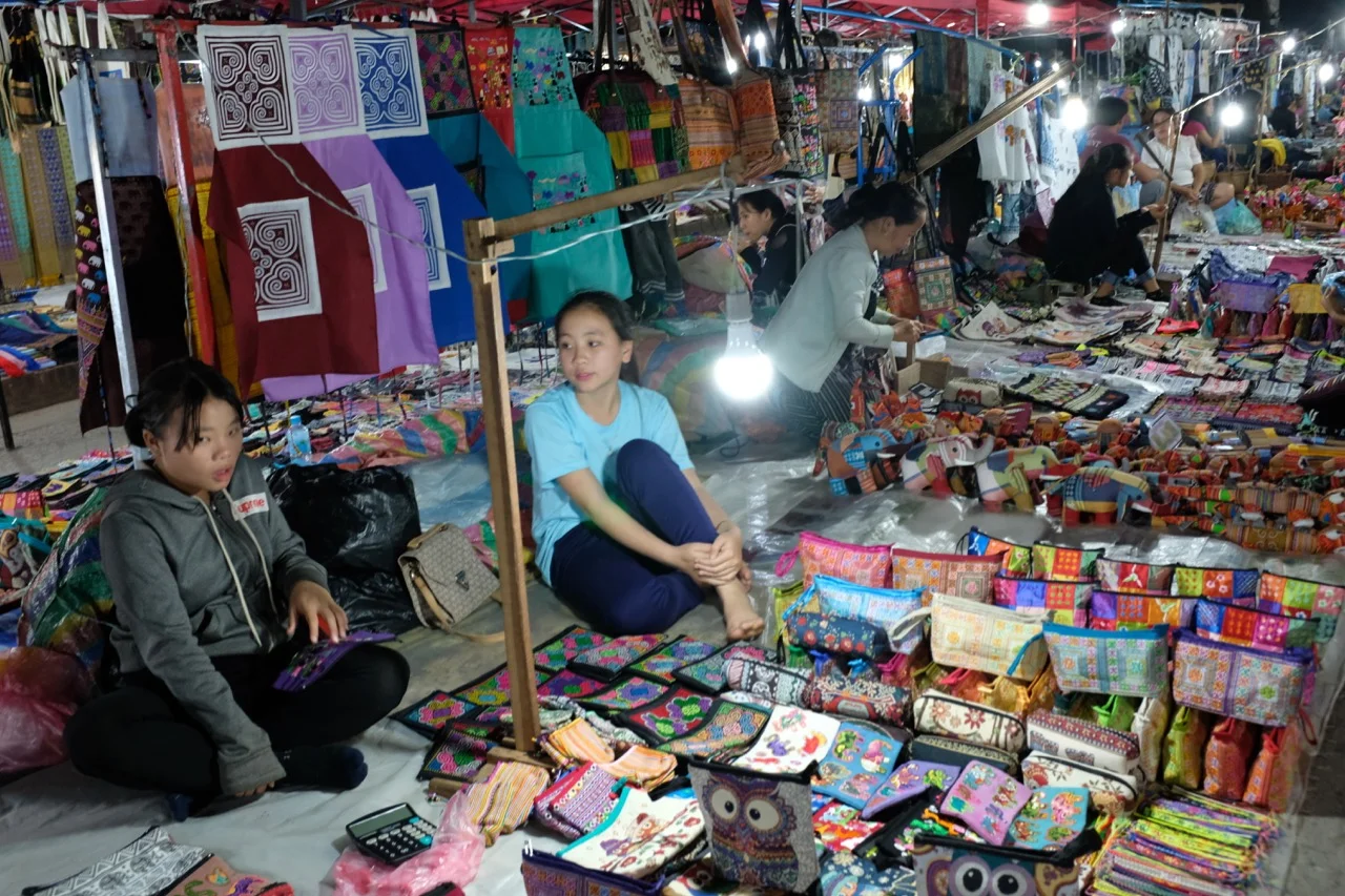 At night the Main Street running through Luang Prabang becomes a big night market featuring stalls like these.