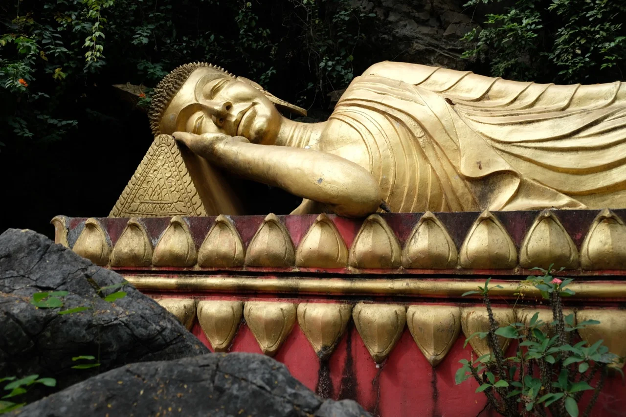 This reclining Buddha on the hillside of Mount Phu Is captures well the relaxed and meditative atmosphere of the ancient Lao capital of Luang Prabang.