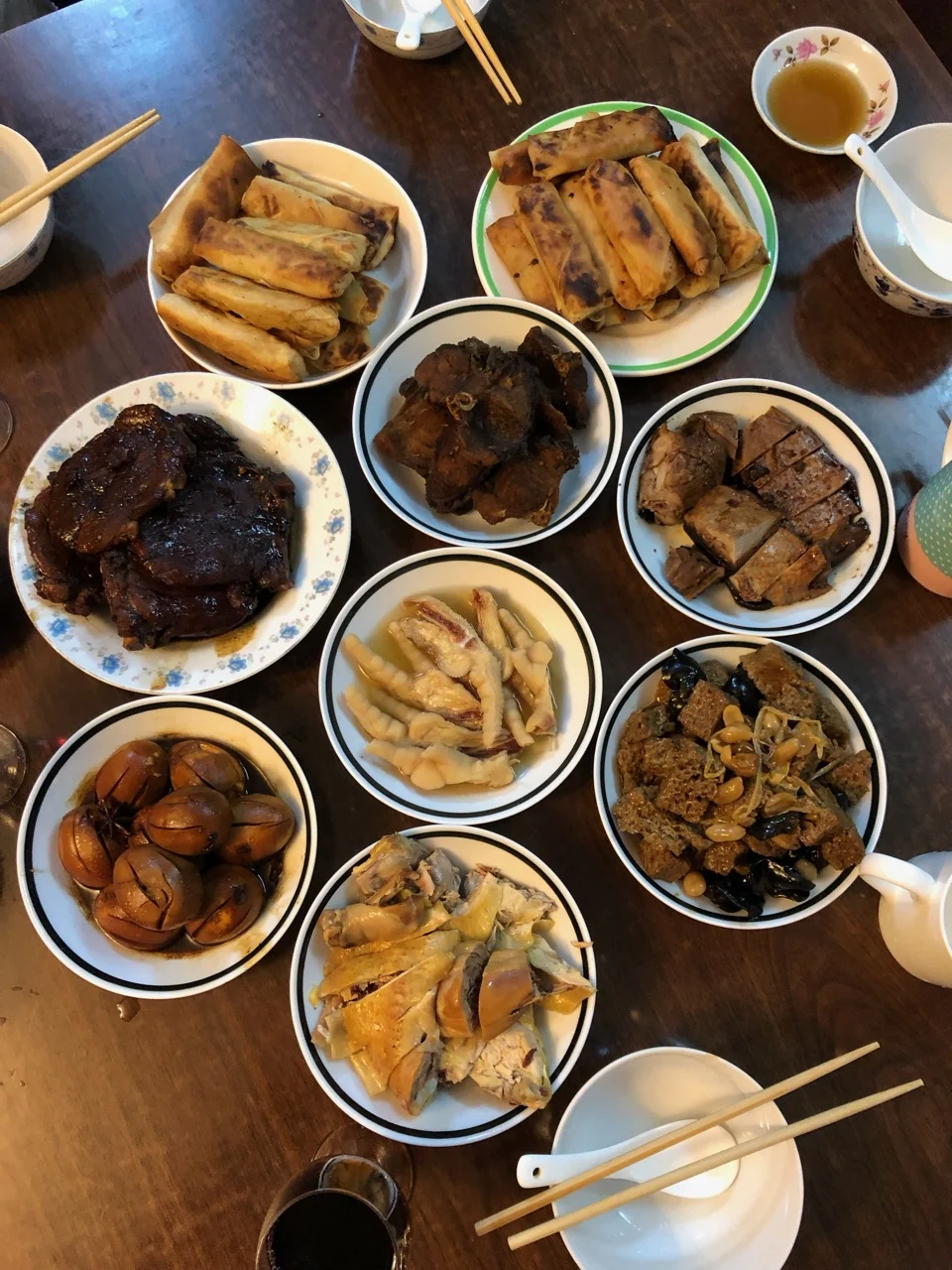 A classic Shanghai-style New Year’s dinner cooked by my father-in-law: spring rolls, duck, chicken, fish, eggs, kaofu, pork chops, and chicken feet!