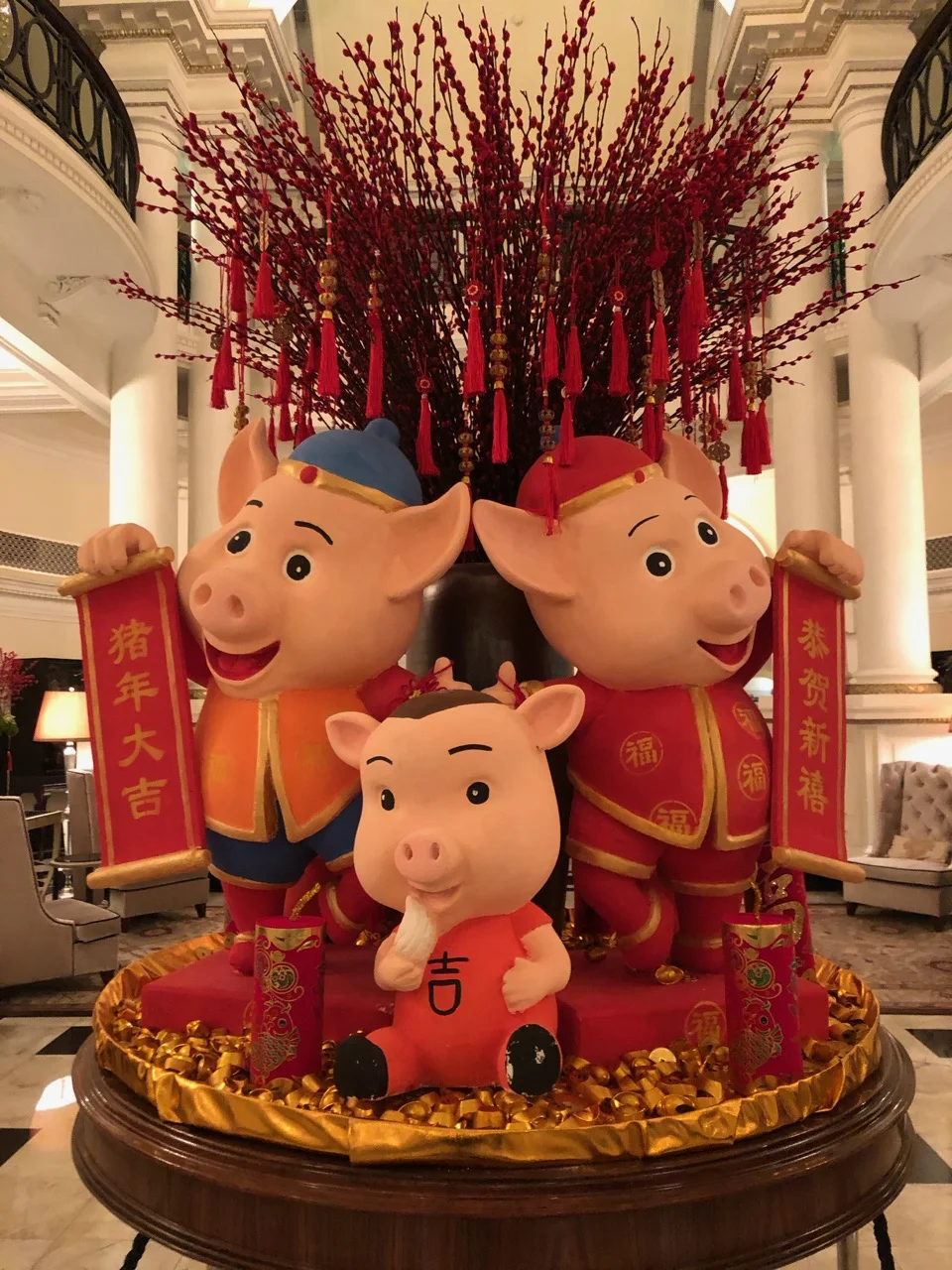 Three little pigs, a New Year display at the Waldorf Astoria on the Bund