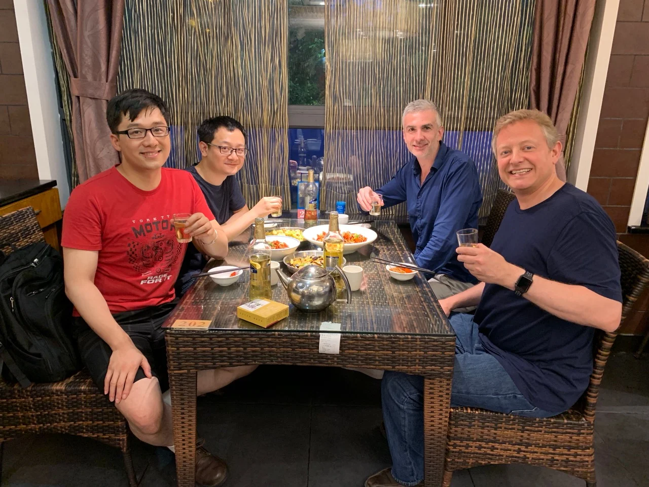 Enjoying a fine Hunanese meal with my co-panelists Renren, Junting, and Cedric