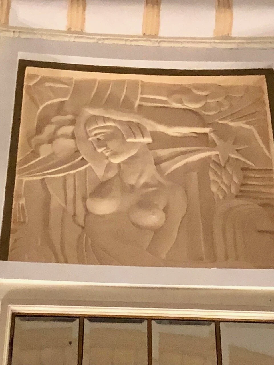 This is one of many bas relief figures that grace the ballroom, which are still there today after nearly a century of revolutionary history in Shanghai
