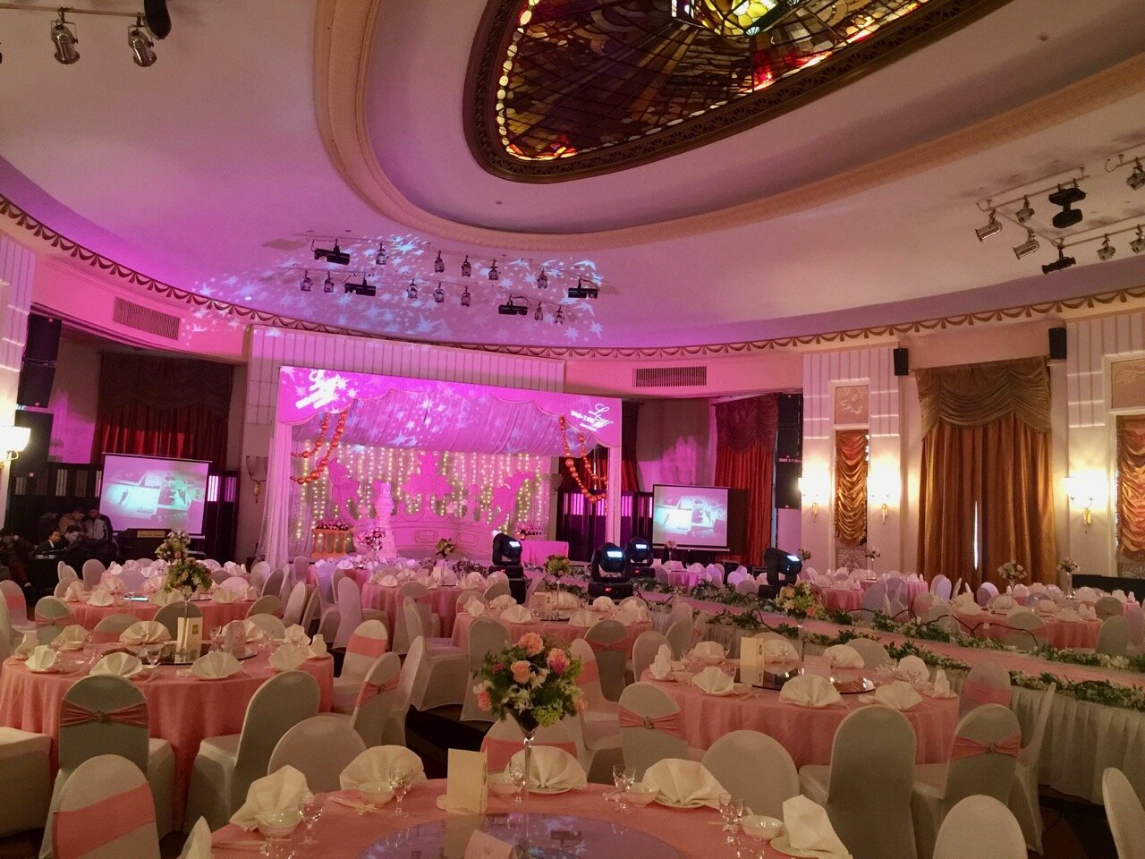 The ballroom is being gussied up for a private wedding party. Unfortunately the original sprung dance floor is hidden by a thick rug.