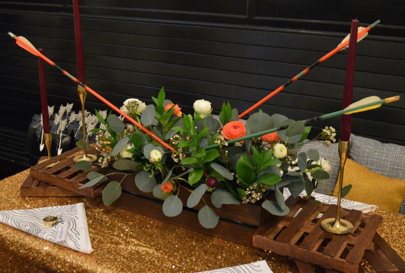 Floral recipe featuring ranunculus, wax flower, and eucalyptus. Vintage arrows thrown in as well!