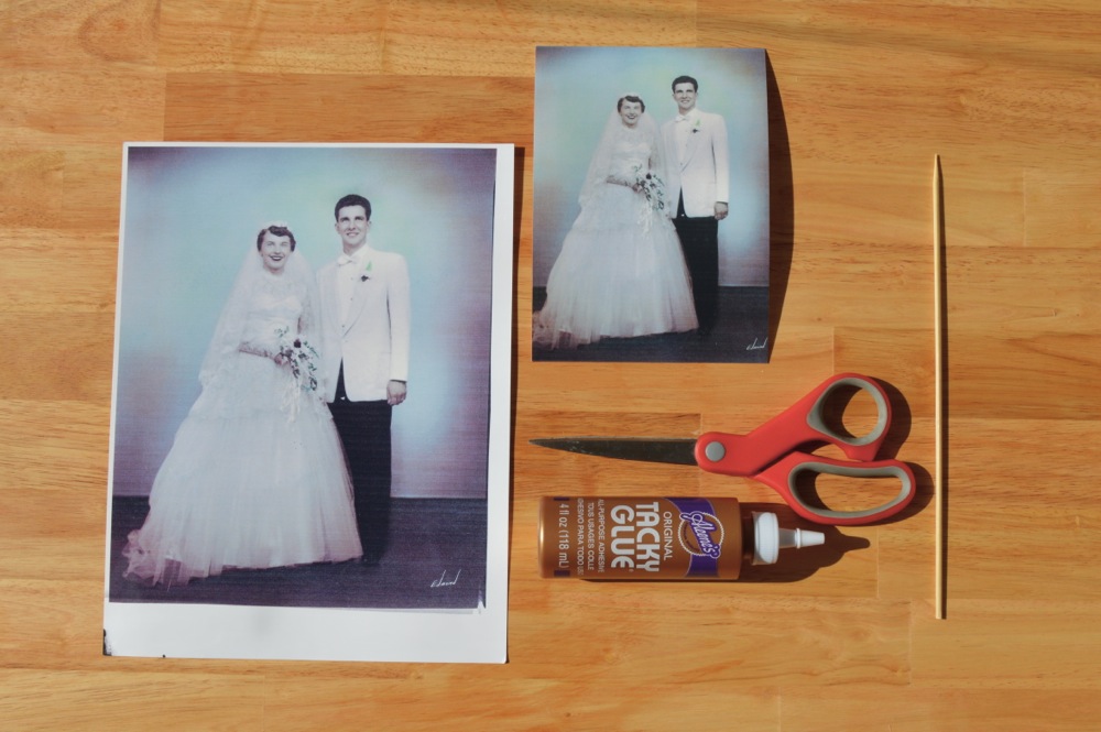 To make the cake topper you'll need a copy of a old photograph, cardstock, glue, a wood skewers, and scissors.