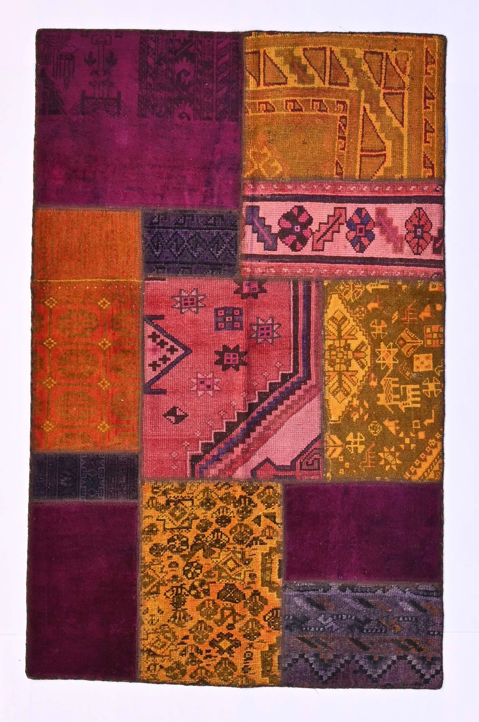 504404-96x151-small-plum-ochre-persian-collage-rug.jpg
