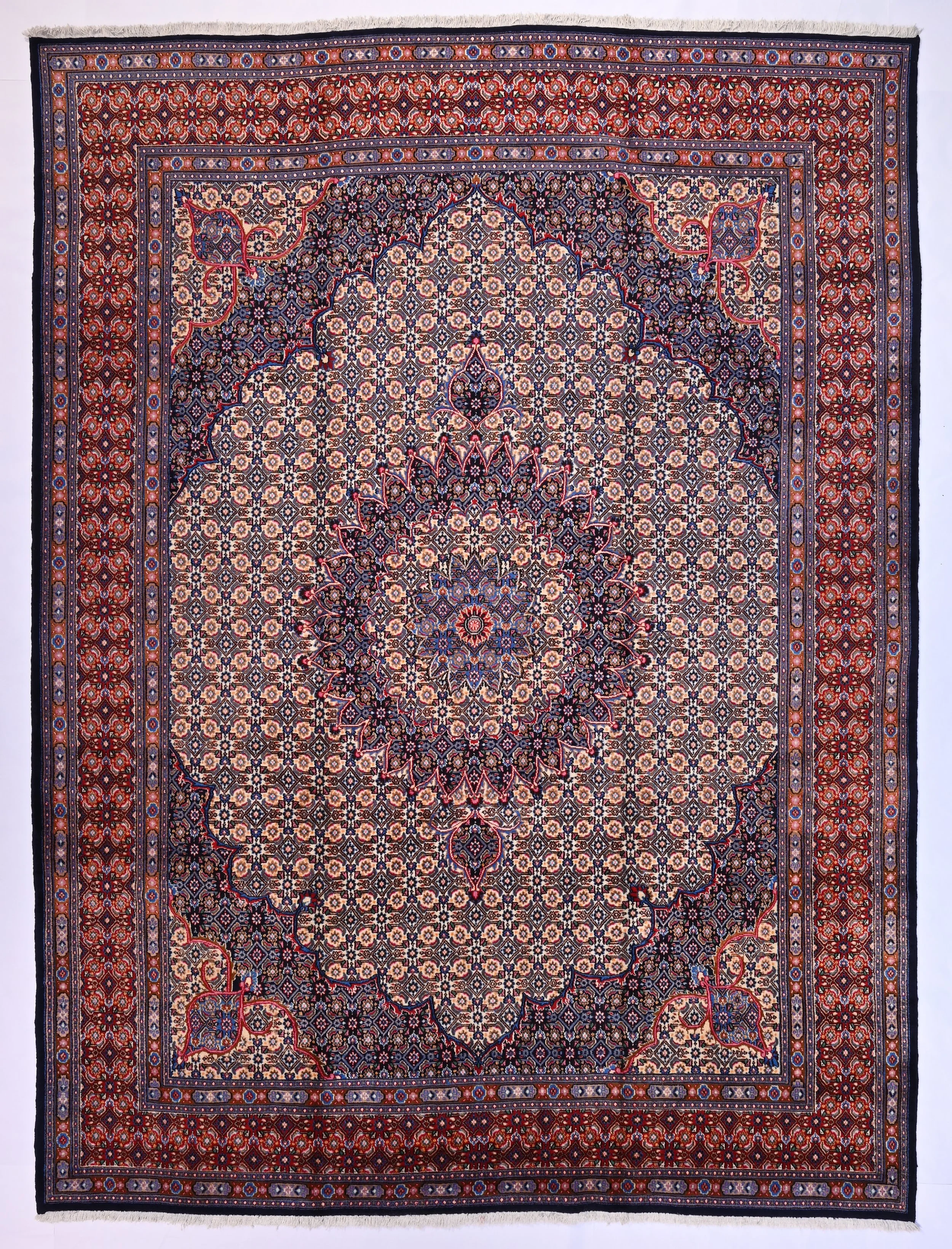 Mud carpet 150919 with an ivory Herati field, navy medallion and red border, 375 by 282 cm.