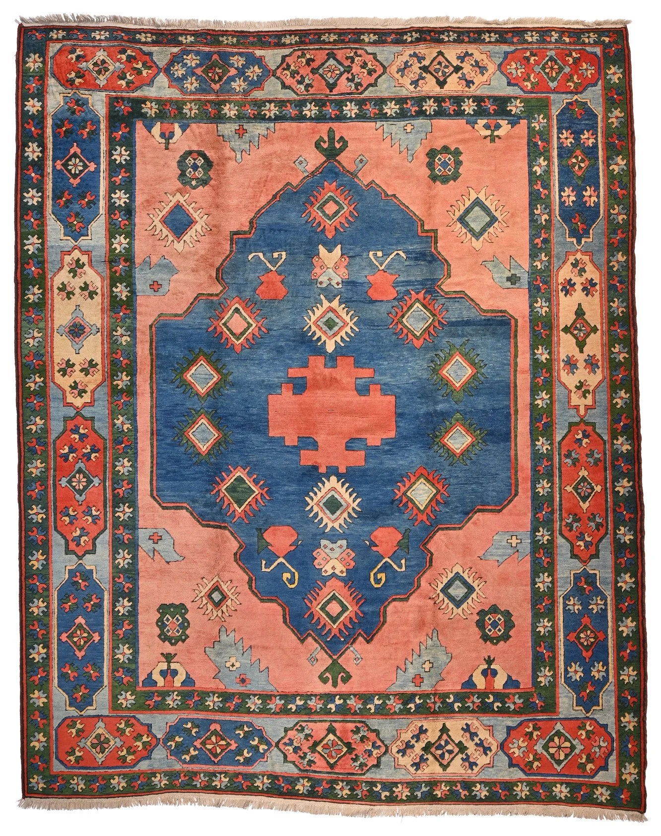 Ermenek Turkish wool rug 22330, 381 × 305 cm, with a blue geometric medallion, coral field and multicoloured border.