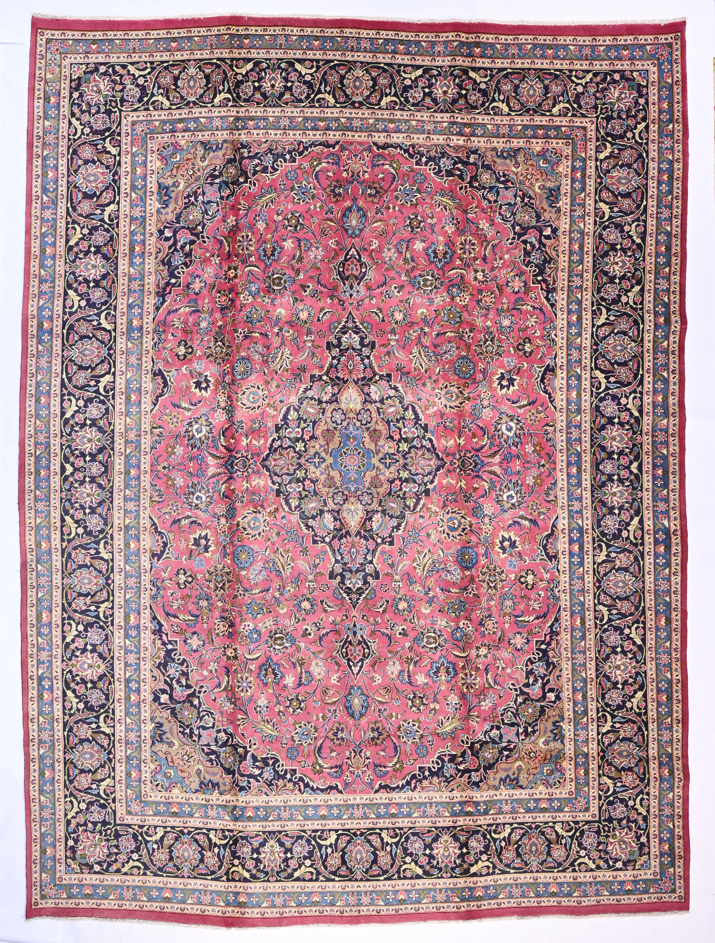 Kashmar carpet 133846 with a rich rose floral field and deep navy border, 405 by 302 cm.