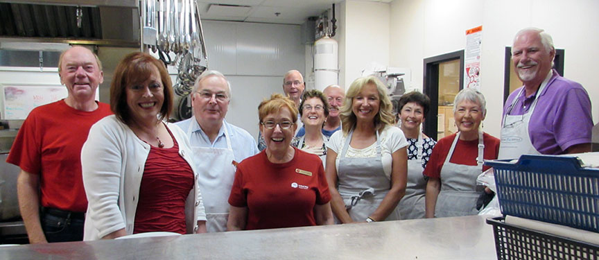 Serving breakfast at "Our Place" - Volunteering and being involved in our community is extremely important to me