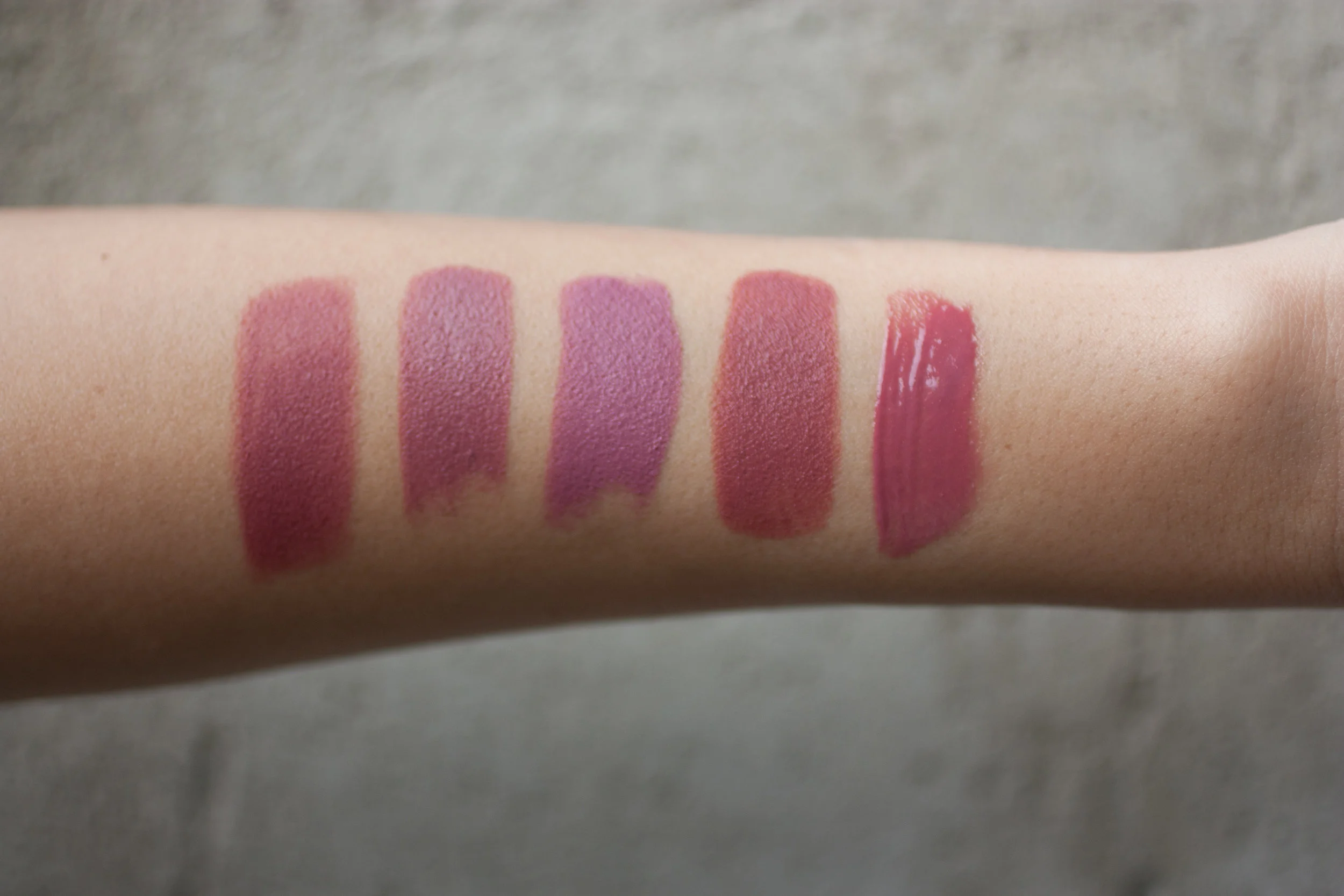 LEFT TO RIGHT: Charlotte Tilbury Bond Girl, Bite Beauty Pepper, NARS Anna, Bite Beauty Chai, bareMinerals Heartbreaker Gloss