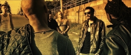 Vigilante cop Ronan Pierce (Michael McCarthy) faces down a street gang